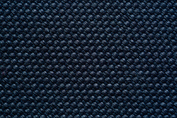 Black macro fabric texture,Fabric texture. Fabric background. Texture of rough black fabric. Macro image from canvas pattern
