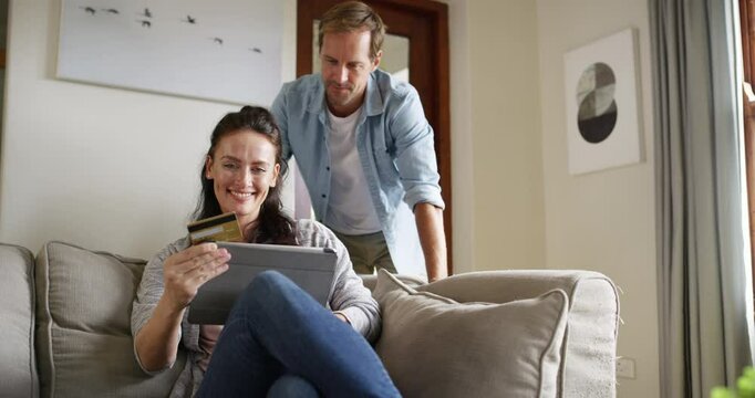 Credit card, home tablet and happy couple online shopping payment, discount code or typing fintech banking password. Web omnichannel, customer sale and marriage people search ecommerce marketplace