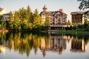 Fototapeta premium Mountain lake Strbske pleso. Strbske lake with view of the High Tatras National Park, Slovakia