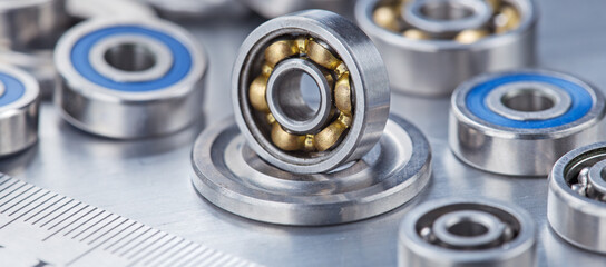 different bearings on a metal background. Part of mechanism.