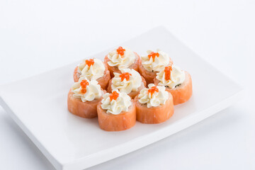 Sushi set and composition at white background. Japanese food restaurant, sushi maki gunkan roll plate or platter set.