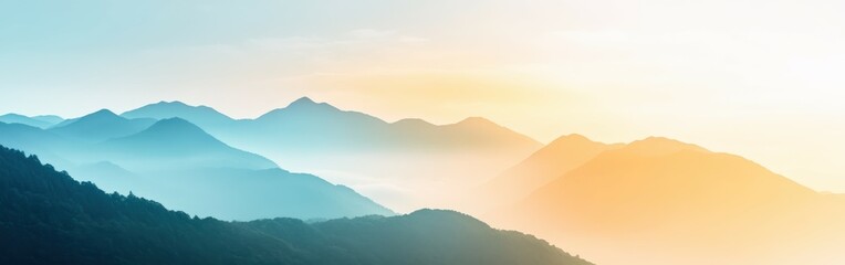 Obraz premium Sunrise over misty mountains with soft colors in the early morning