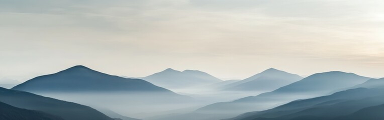Misty morning mountains with rolling hills and soft pastel sky