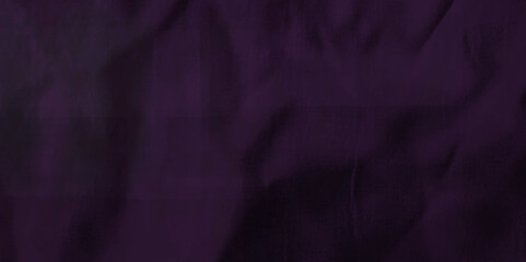 Purple crumpled paper texture in low light background. Silk cloth texture. Fabric pattern. crumpled kraft paper. A crumpled sheet of dark pink and purple paper abstract background. old paper texture. 