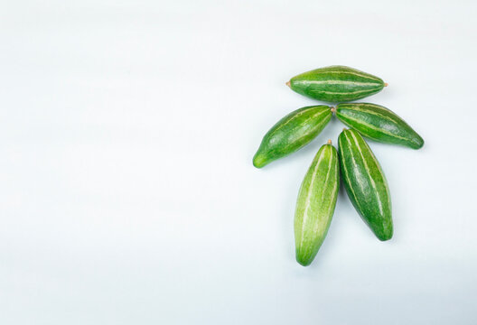Potol is a small, green, Pointed Gourd that is native to India, also called Parval in Hindi and Putulika in Sanskrit.   It is a vital summer vegetable in Bangladesh and West Bengal. Pointed Gourd.