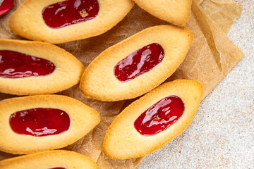 christmas cookies strawberry jam boat shape sweet cookies baked background New Year's holiday fresh meal food snack on the table copy space food background rustic top view