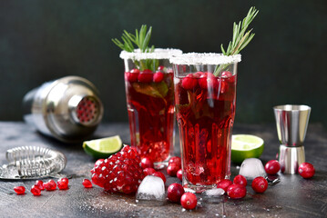 Cranberry cocktail with pomegranate and rosemary.