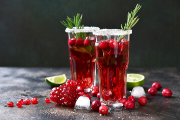 Cranberry cocktail with pomegranate and rosemary.