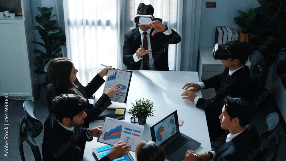 Poster top view of manager working on laptop and sending data analysis to business people by using vr glass