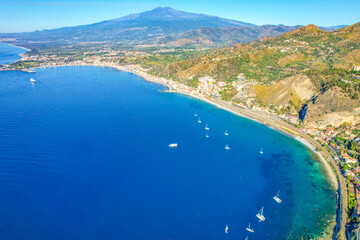 Fototapeta premium Aerial view of the Ancient theater of Taormina with Mount Etna in the background, Sicily, Italy