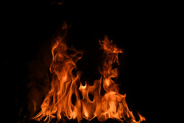 Fire flame burning and fire glowing on black background.