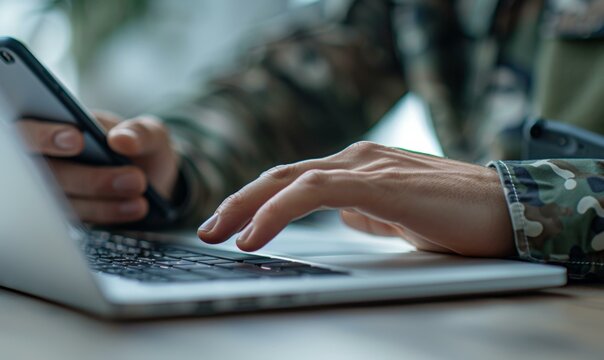 A person in military uniform typing on a laptop computer. AI.