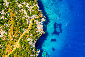 Fototapeta premium Blue caves on Zakynthos island or Zante Island, Greece. Beautiful views of azure sea water and nature with cliffs cave