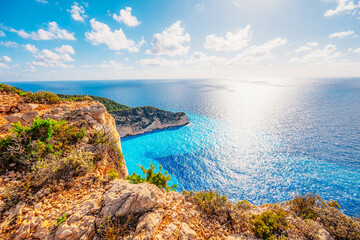Zakynthos, Greece. Navagio Beach with wrecked ship in Ionian Sea. Beautiful views of azure sea water and nature with cliffs cave.