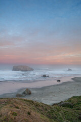 Sea stacks at sunset on the southern Oregon coast, Bandon, USA.