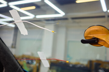 Installing windshield on a car with automotive design