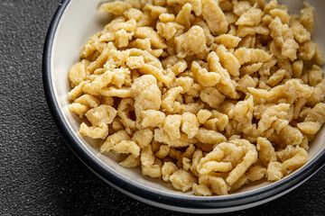 egg pasta spaetzle shape fresh meal food snack on the table copy space food background rustic top view