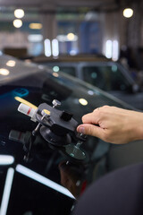 Installing windshield on a car with automotive design