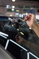 Installing windshield on a car with automotive design