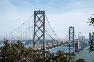 Day time view San Francisco-Oakland Bay Bridge and San Francisco Skyline. Yerba Buena Island, San Francisco, California, USA.