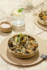 vongole with greens on a beige background
