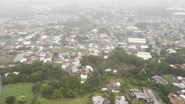 View from an airplane descending over central Costa Rica on approach to San Jose International Airport.
