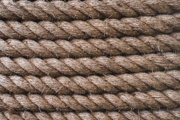 Full frame background of strong , thick rope made from natural fibres