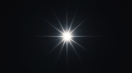 Bright light burst resembling a star on a black background. The image emphasizes the radiating light beams and contrast against the dark surroundings