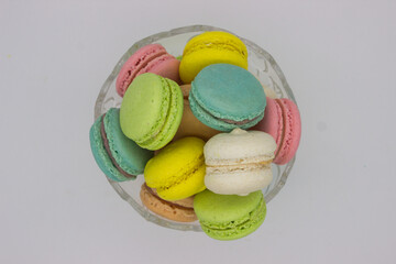 Top View of Colorful Macarons in a Glass Bowl