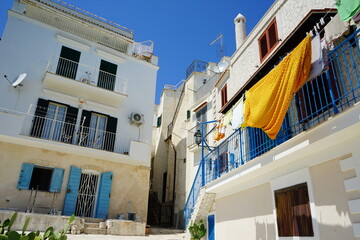 Typical white houses of Vieste in a summer day, Gargano, Puglia, Italy