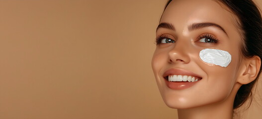 Radiant woman applying nourishing face cream for glowing skin and daily beauty routine, natural skincare and self-care. Banner with copy space