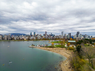 Fototapeta premium Top cinematic aerial view. Downtown Vancouver British Columbia. Aerial View Of Skyline Buildings.