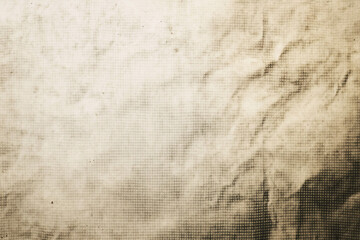 Fototapeta premium An abstract grunge pattern with dotted elements on a textured surface, featuring blue and beige tones