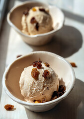 Homemade ice cream with rum and raisins.	
