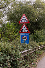 Low bridge height and weight restriction warning road signs