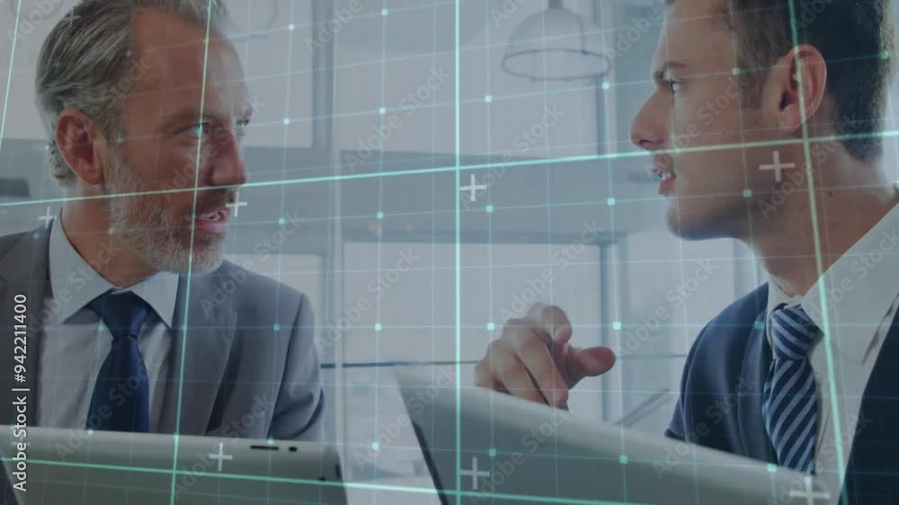 Poster animating grid and data points, business professionals discussing information on tablet