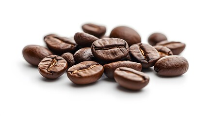 Assortment of coffee beans arranged on a clean white surface, showcasing various shades of roast