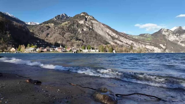Swiss Alps mountains highlights Walensee lake waves Weesen St. gallen