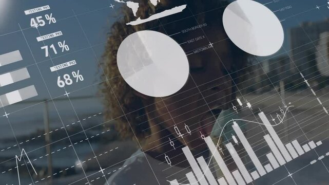 Analyzing data outdoors, woman viewing animated charts and graphs