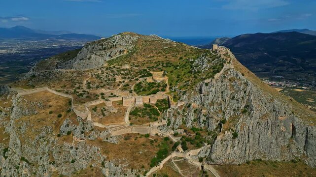 Drone view of ancient Acrocorinth mountain castle fortress in Corinth, Greece