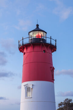 USA, Massachusetts, Cape Cod, Eastham. Nauset Light with Christmas wreath at dawn.
