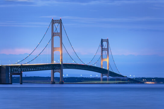 Lights on Mackinac Bridge at twilight, seen from Mackinaw City Michigan