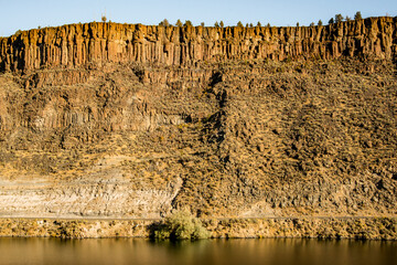 USA, Oregon. Cove Palisades State Park, columnar basalt from lava flows in cliffs above west shore of Lake Billy Chinook.