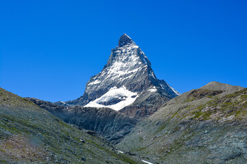 Stunning view of the magnificent Matterhorn mountain, Valais, Switzerland. Swiss Alps landscape in Summer. Space for copy. 


