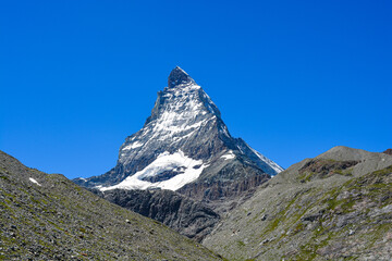 Stunning view of the magnificent Matterhorn mountain, Valais, Switzerland. Swiss Alps landscape in Summer. Space for copy. 


