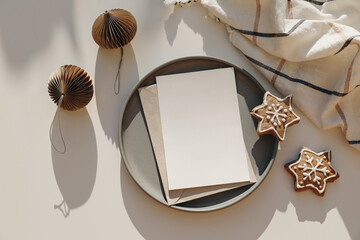 Winter festive greeting card on plate mockup scene. Star shaped gingerbread cookies and paper...