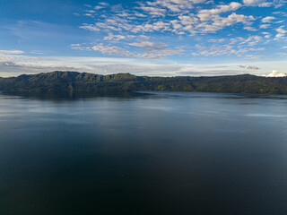 Lake Toba in Sumatra among the mountains. Sumatra, Indonesia.