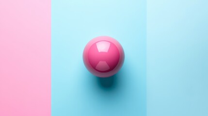 Bright pink sphere on a pastel background of pink and blue colors