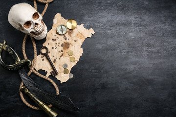 Skull with compass, old key and sword on dark background. Pirate concept