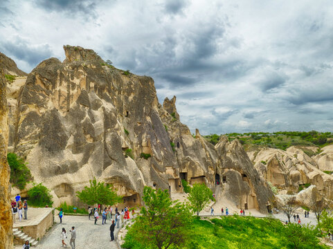 Tourists visiting goreme open air museum with its rock formations and cave churches